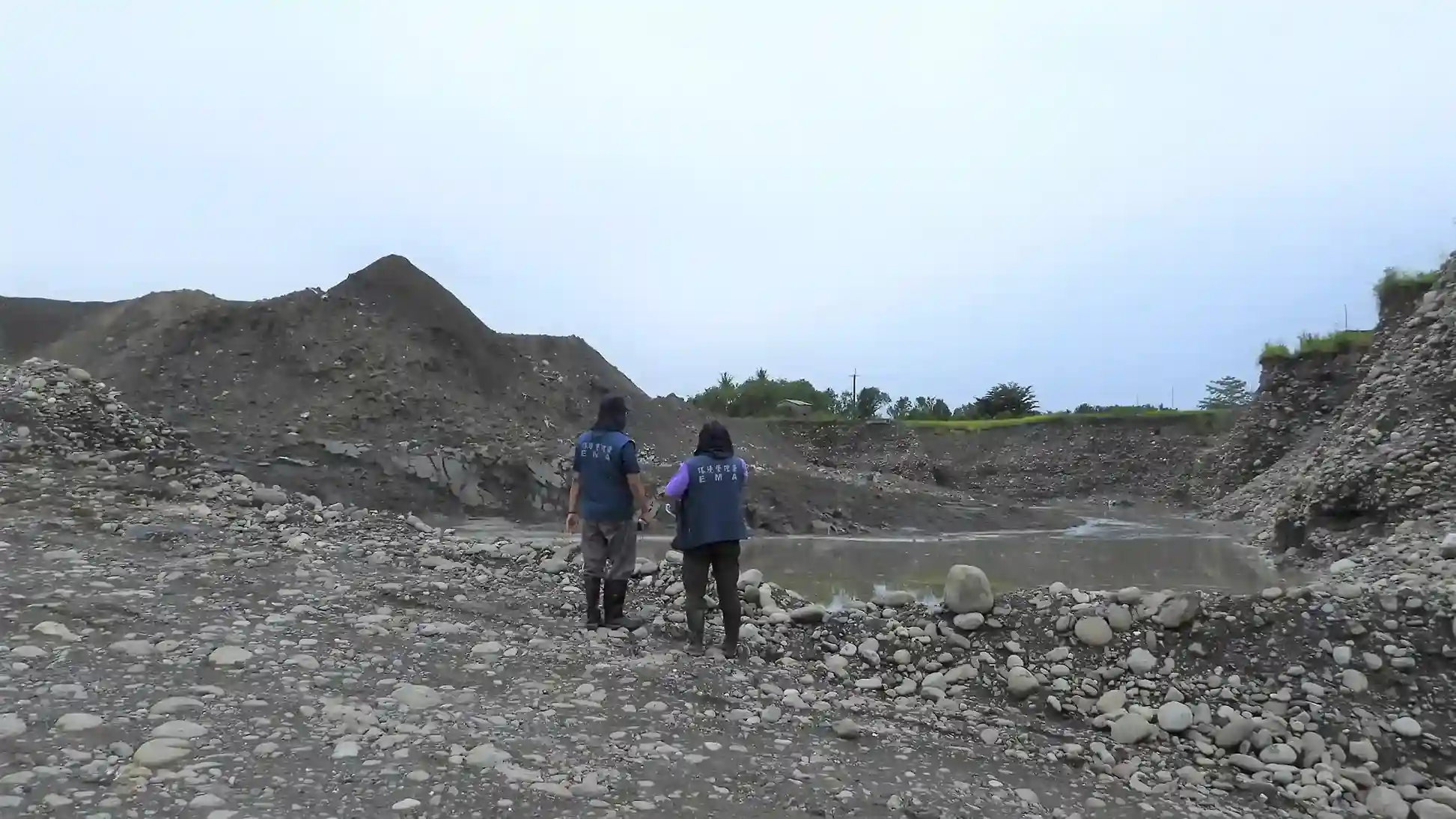 Illegal mining of soil and rocks and burying of construction waste